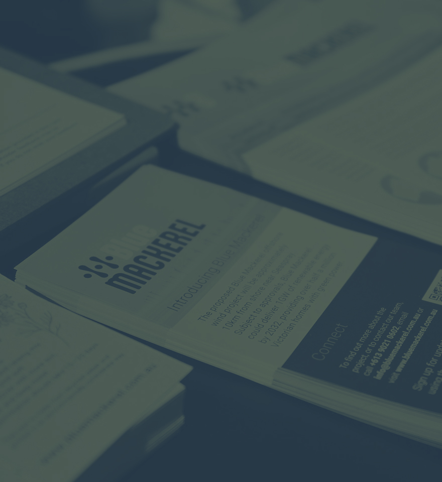 Stack of informational brochures about Blue Mackerel wind project